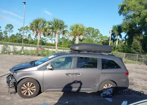 2014 Honda Odyssey Ex-L z USA, uszkodzony, nr VIN 5FNRL5H64EB090153